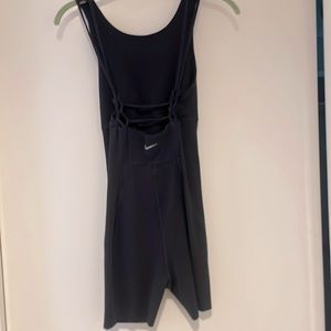 Black Nike one piece shorts , soft spandex material, unique back